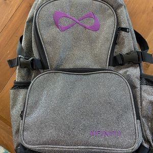Like new silver sparkle NFINITY cheer backpack.  Smoke free home.